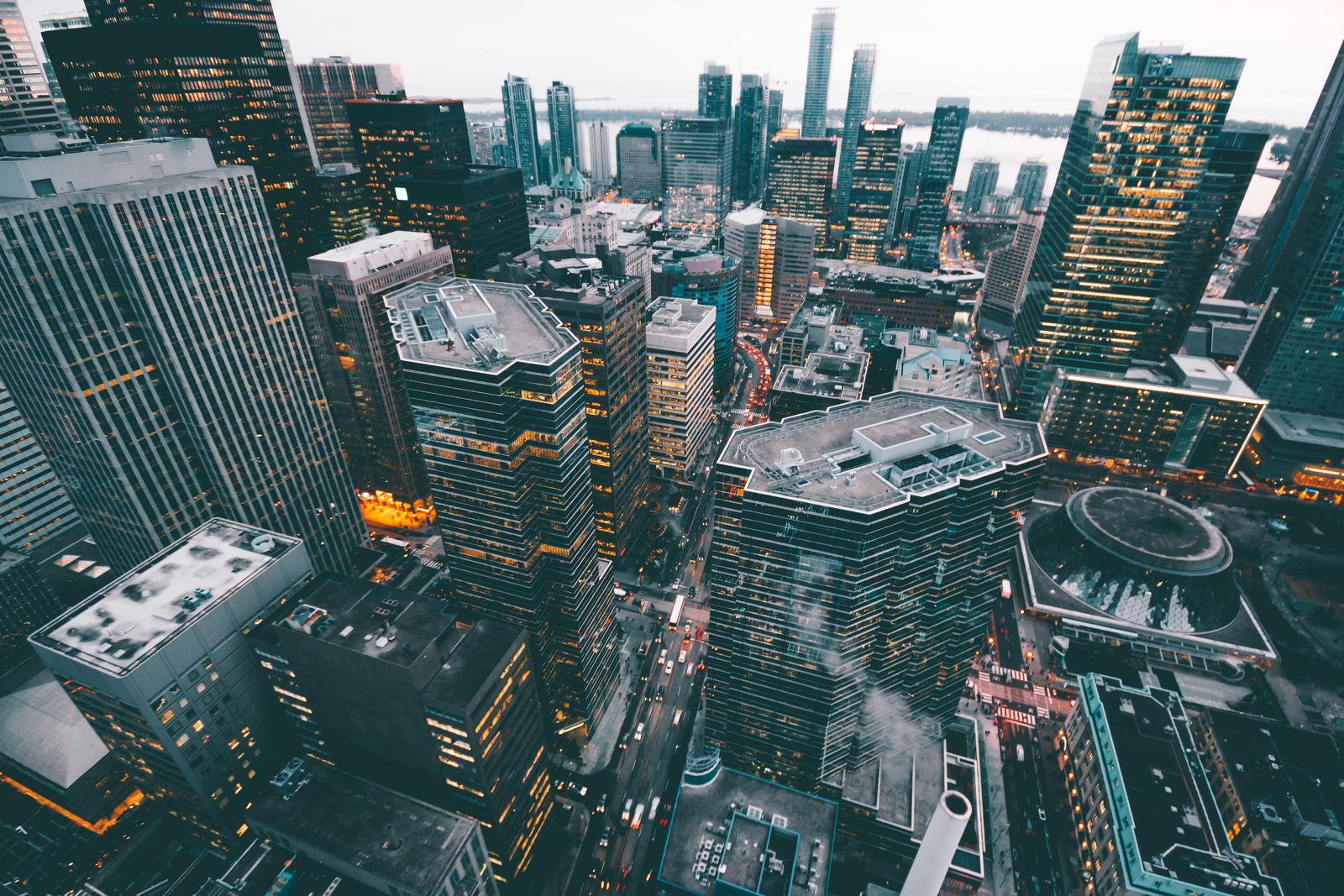 Aerial corporate downtown skyscrapers at blue hour